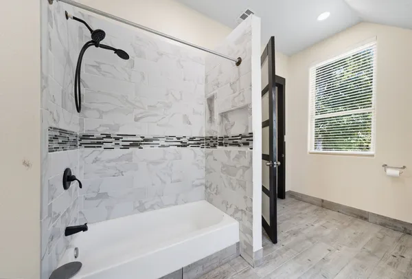 a view of entryway with wooden floor and stairs