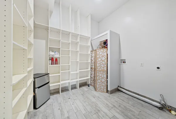 wooden floor and cabinet in a room