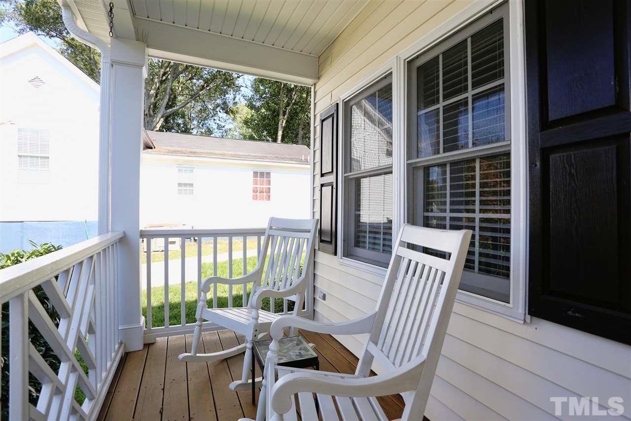 316 Cooke Street Raleigh, NC 27601 - Photo 3 of 23 a view of deck with a large window and wooden floor