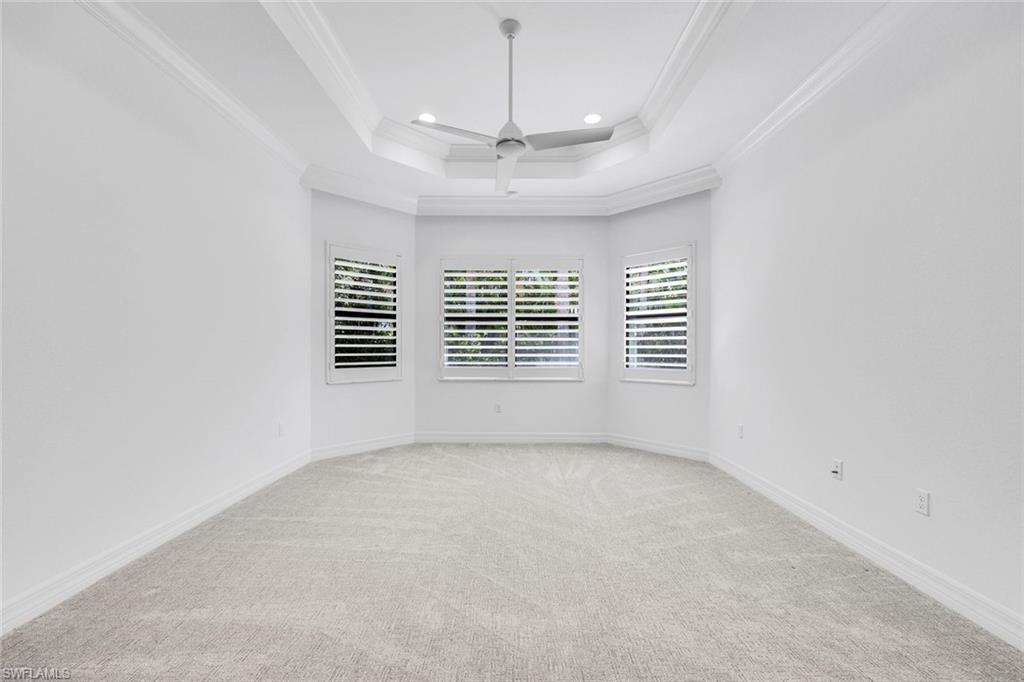 13670 Mandarin Circle Naples, FL 34109 - Photo 12 of 29 en view of an empty room with a window