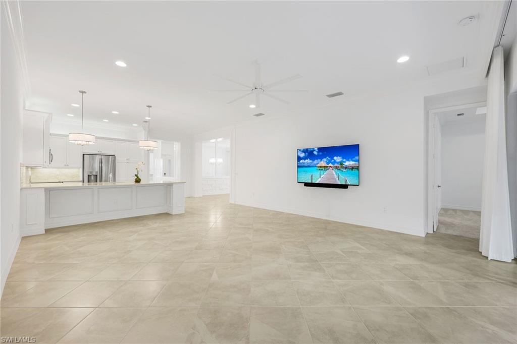 13670 Mandarin Circle Naples, FL 34109 - Photo 5 of 29 a view of a kitchen with a white kitchen