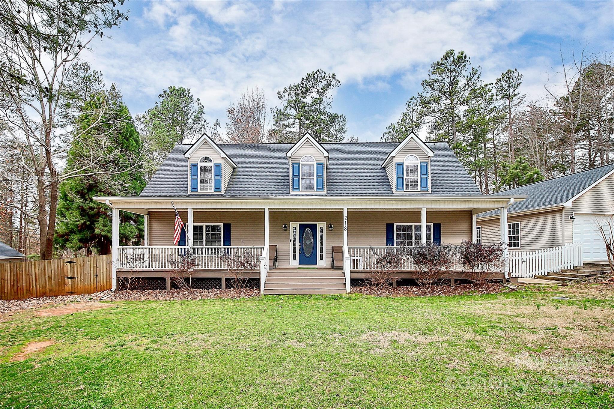 218 Stillwater Road Troutman, NC 28166 - Photo 2 of 43 front view of a house with a yard