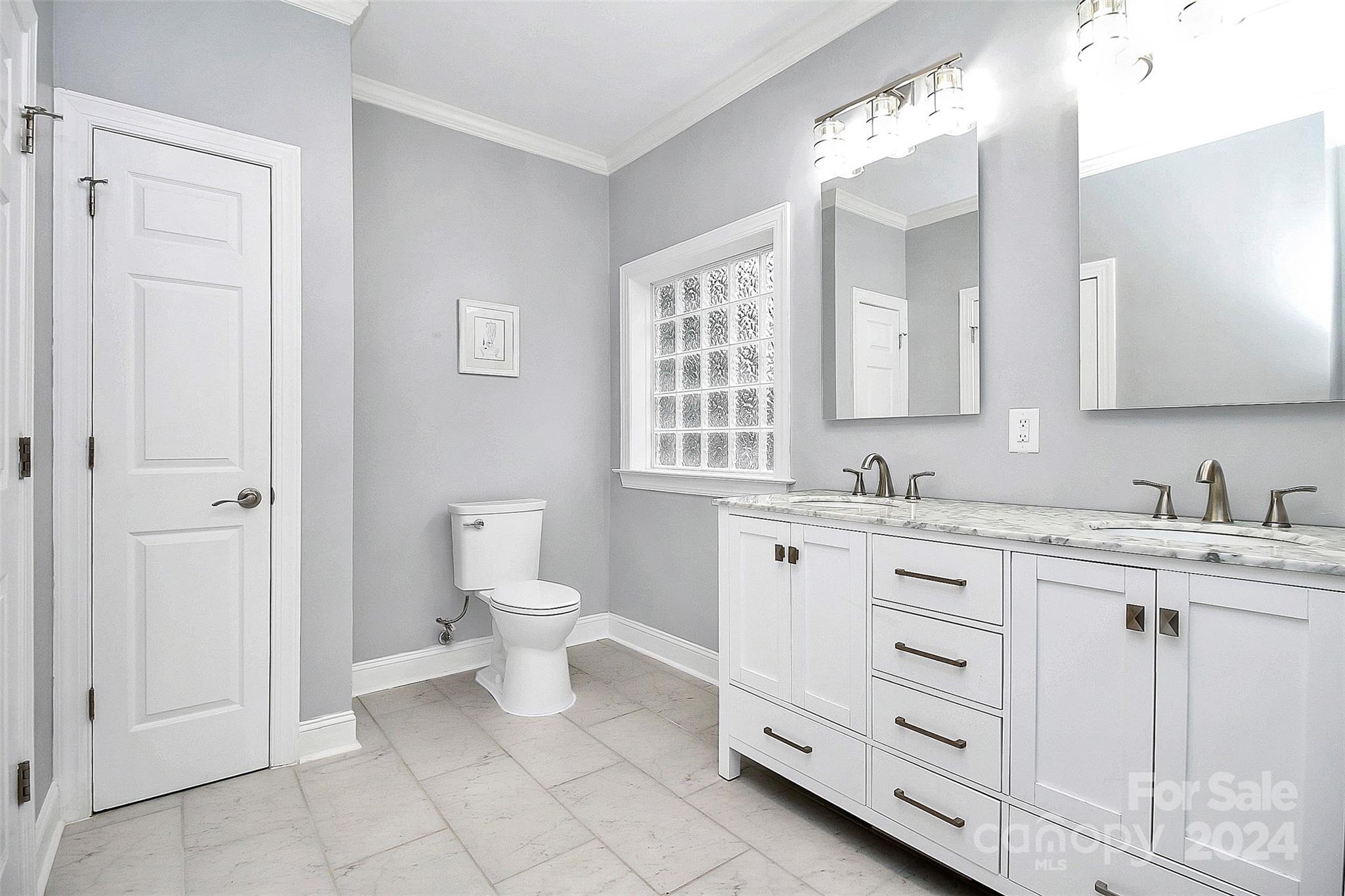 218 Stillwater Road Troutman, NC 28166 - Photo 26 of 43 a bathroom with a granite countertop sink mirror and a toilet