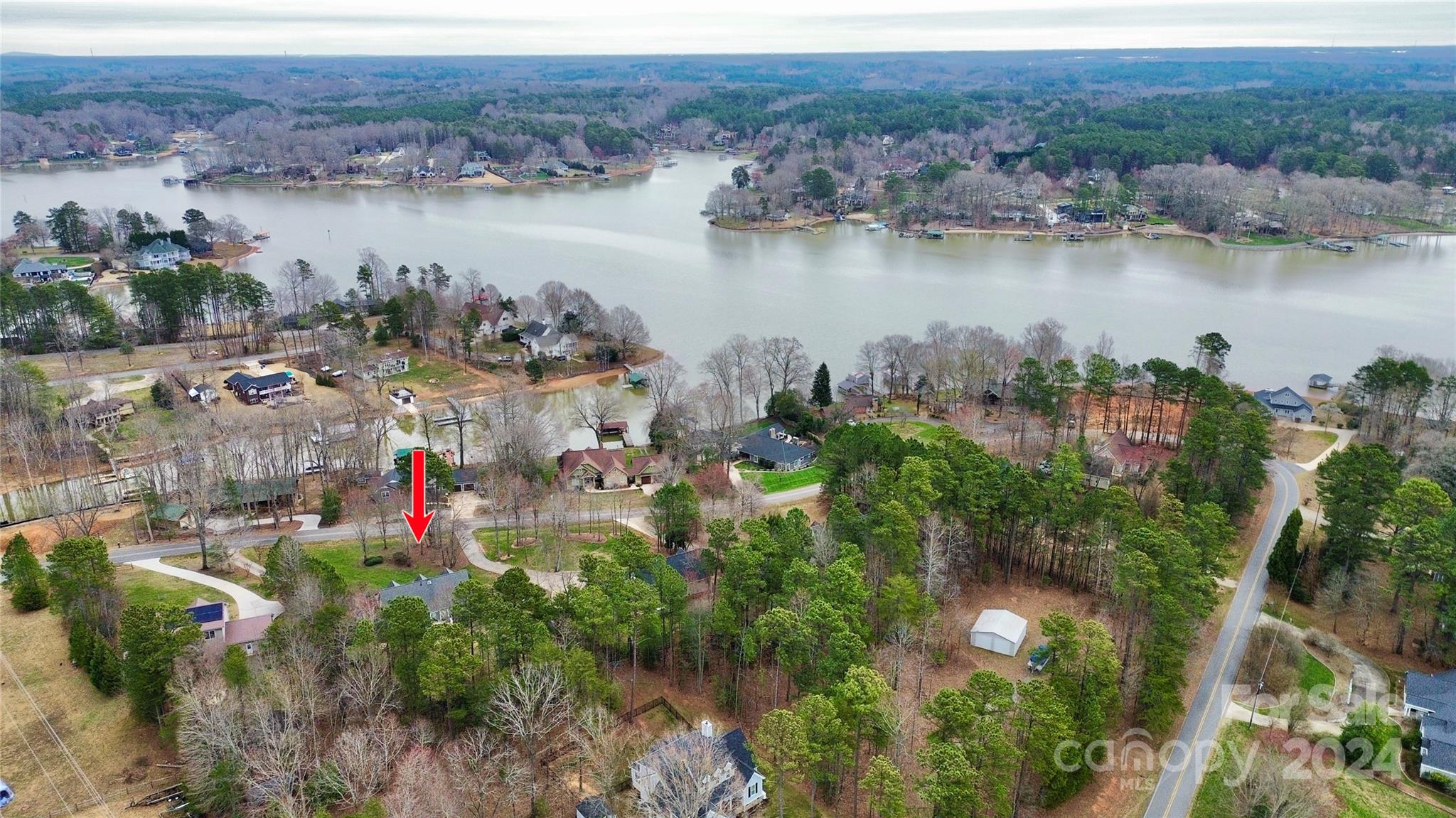 218 Stillwater Road Troutman, NC 28166 - Photo 40 of 43 a view of a lake with a mountain view