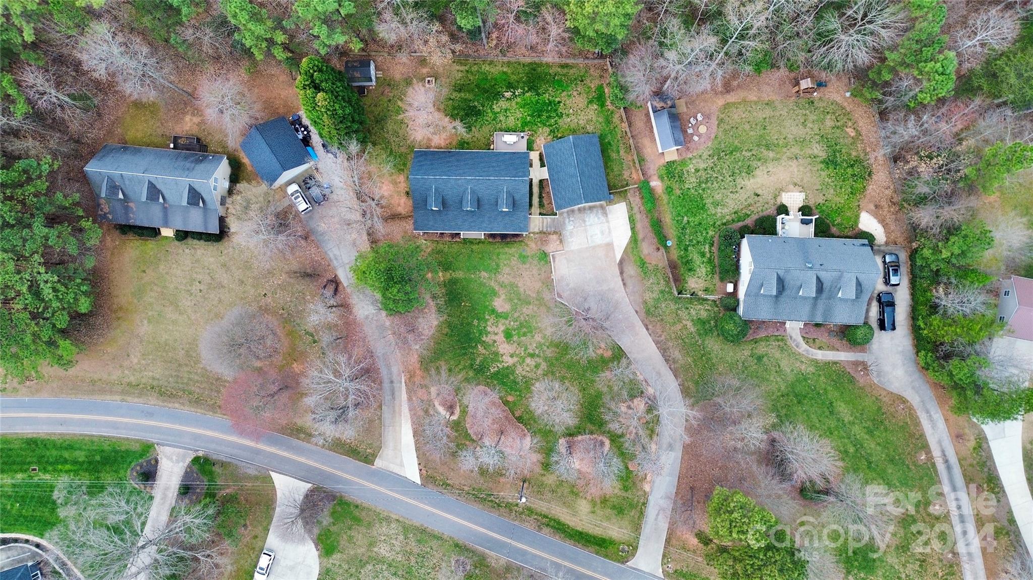 218 Stillwater Road Troutman, NC 28166 - Photo 43 of 43 an aerial view of a house with a yard
