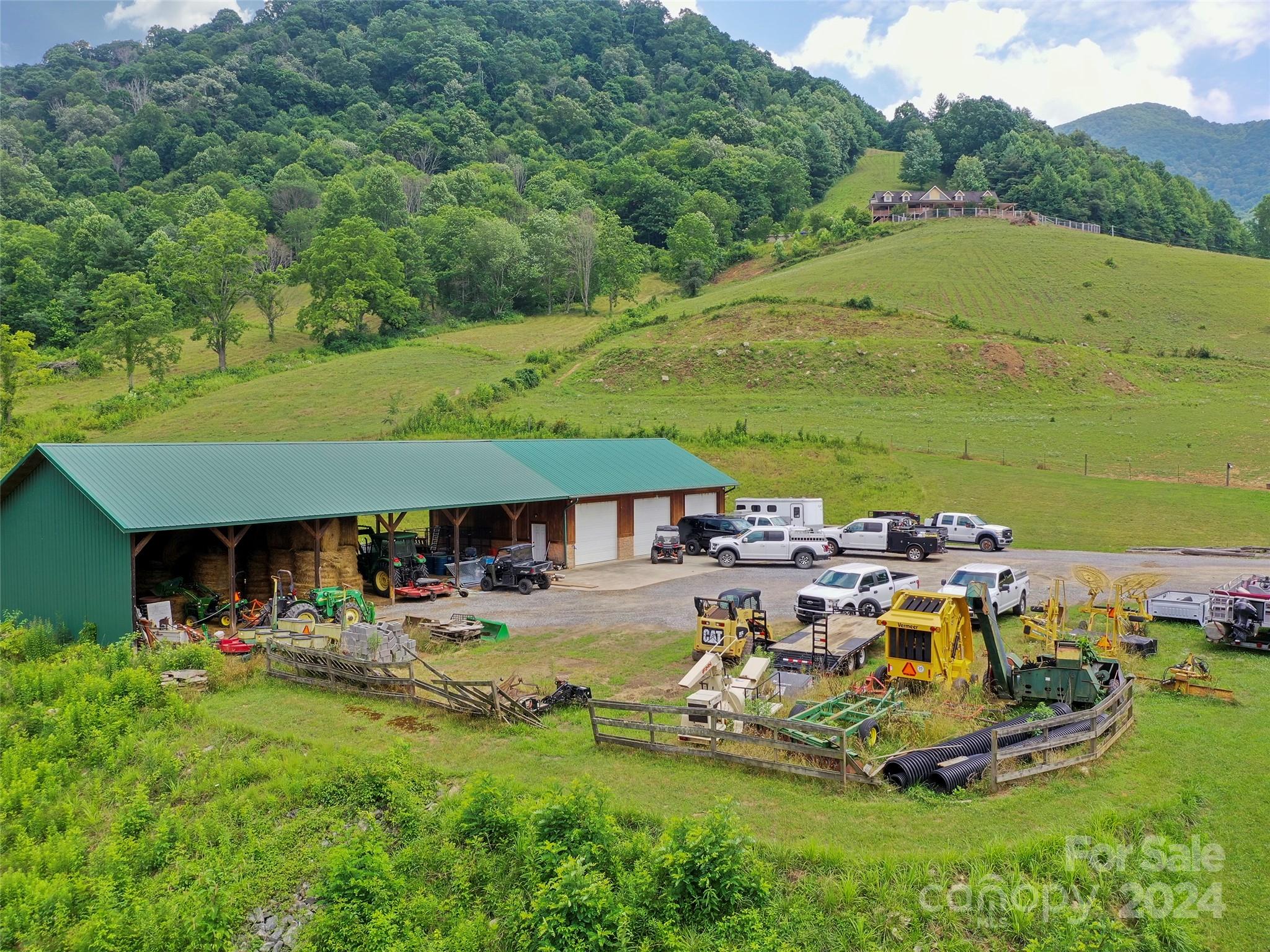 317 Camp Branch Road Clyde, NC 28721 - Photo 19 of 47 an aerial view of a house with outdoor space