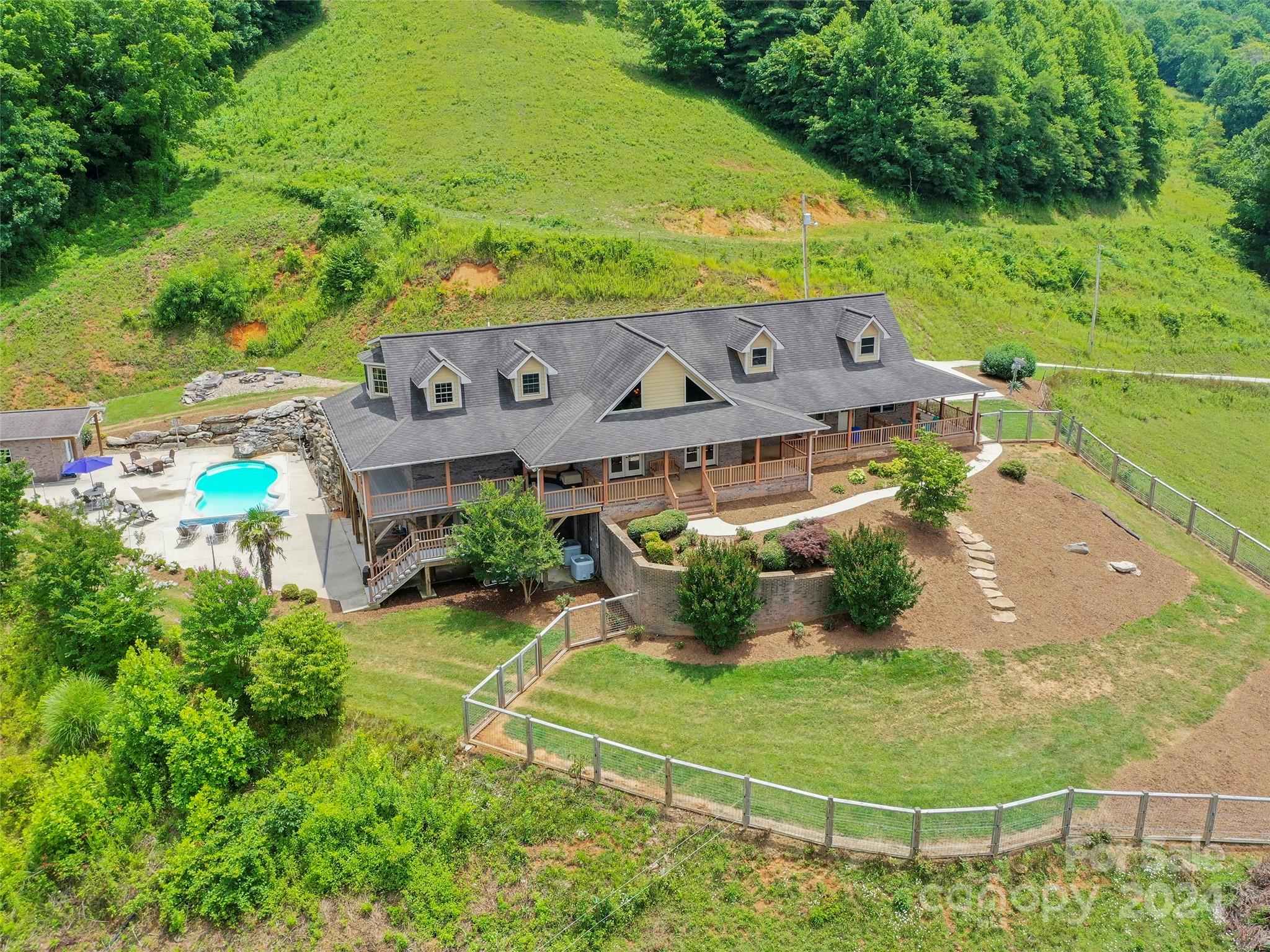 317 Camp Branch Road Clyde, NC 28721 - Photo 3 of 47 an aerial view of a house