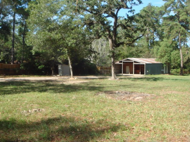 4018 East Mossy Oaks Road Spring, TX 77389 - Photo 13 of 23 a house view with swimming pool