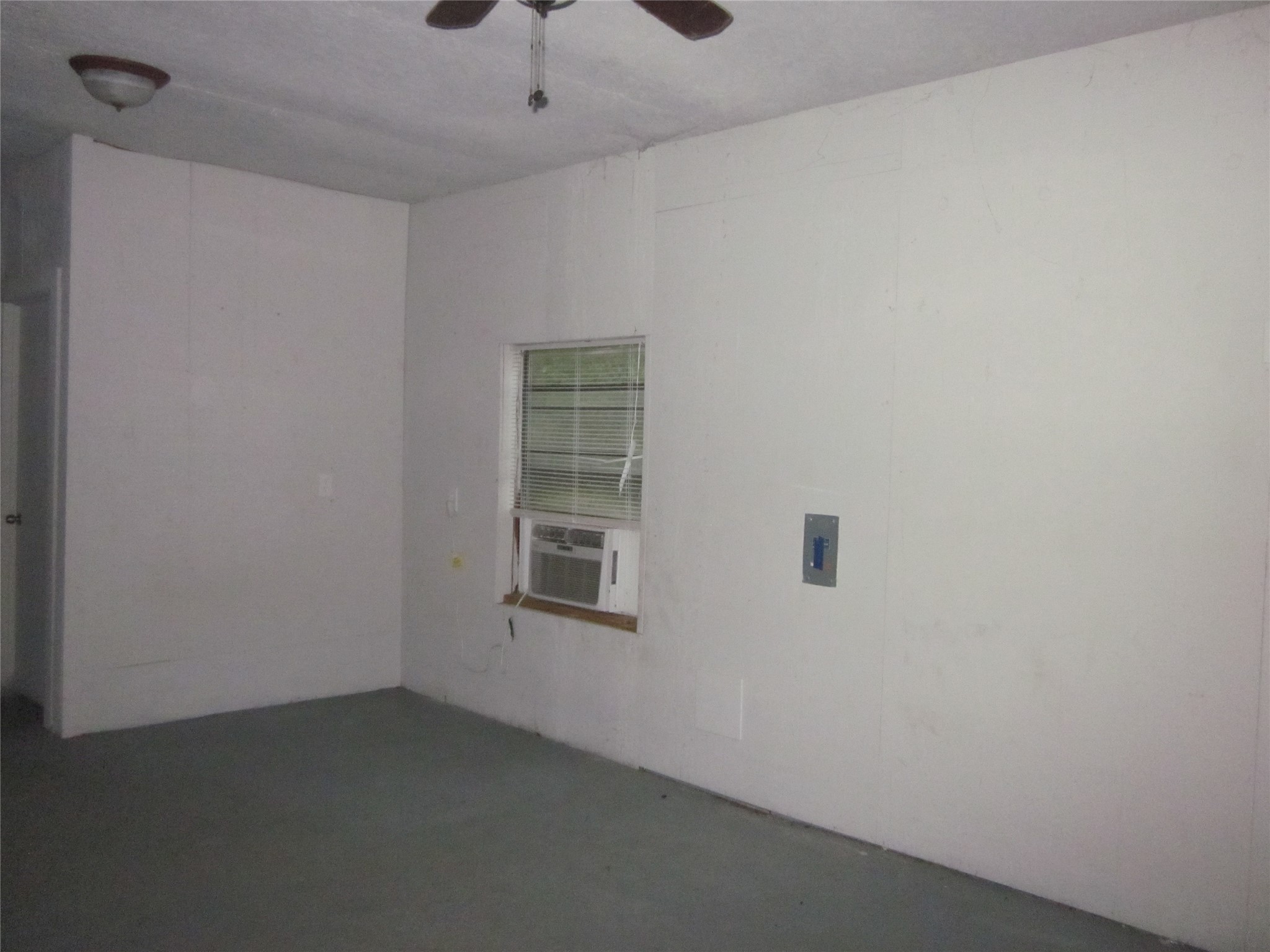 4018 East Mossy Oaks Road Spring, TX 77389 - Photo 20 of 23 an empty room with a empty space and windows
