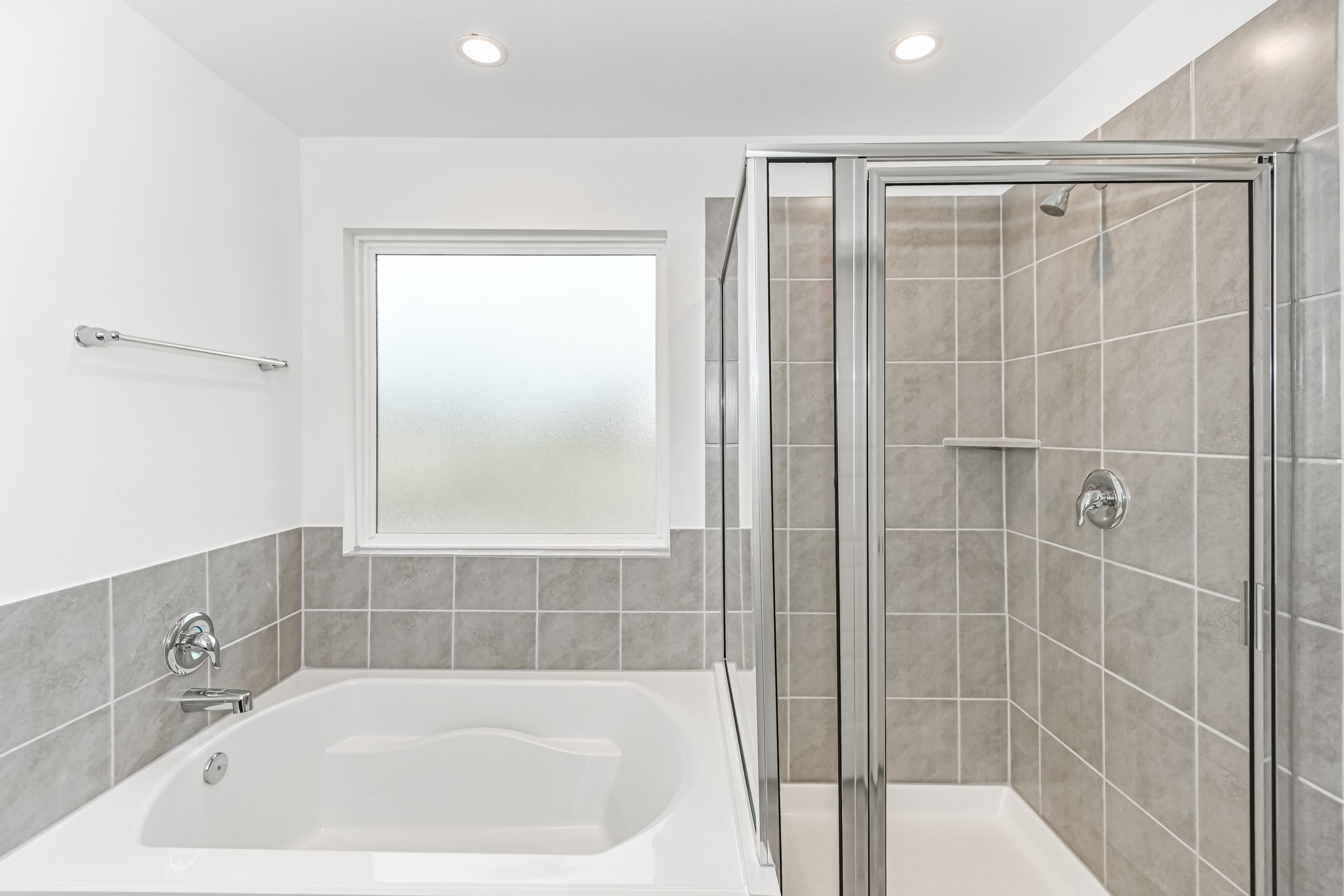 555 Hunter Grove Lane China, TX 77613 - Photo 18 of 21 a bathroom with a bathtub and a shower