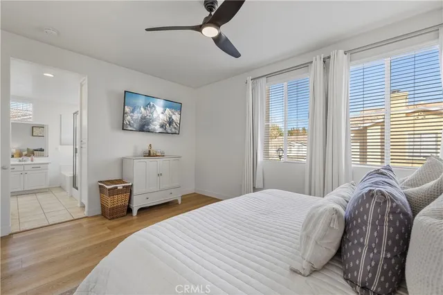 a bedroom with a bed and furniture