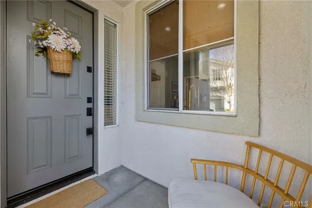 a view of a hallway with front door