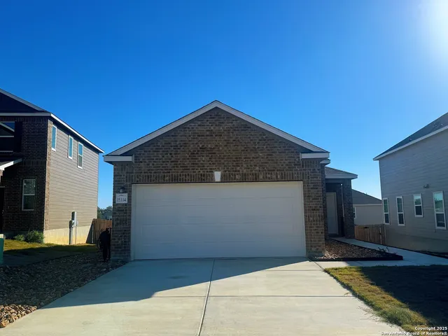 a house view with a garden space