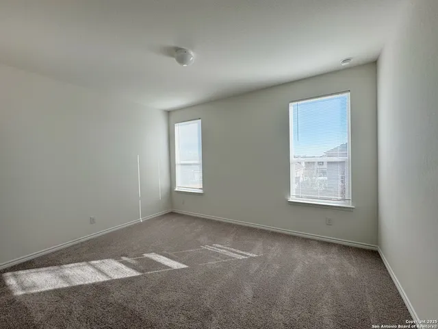 a bathroom with a sink vanity and a mirror