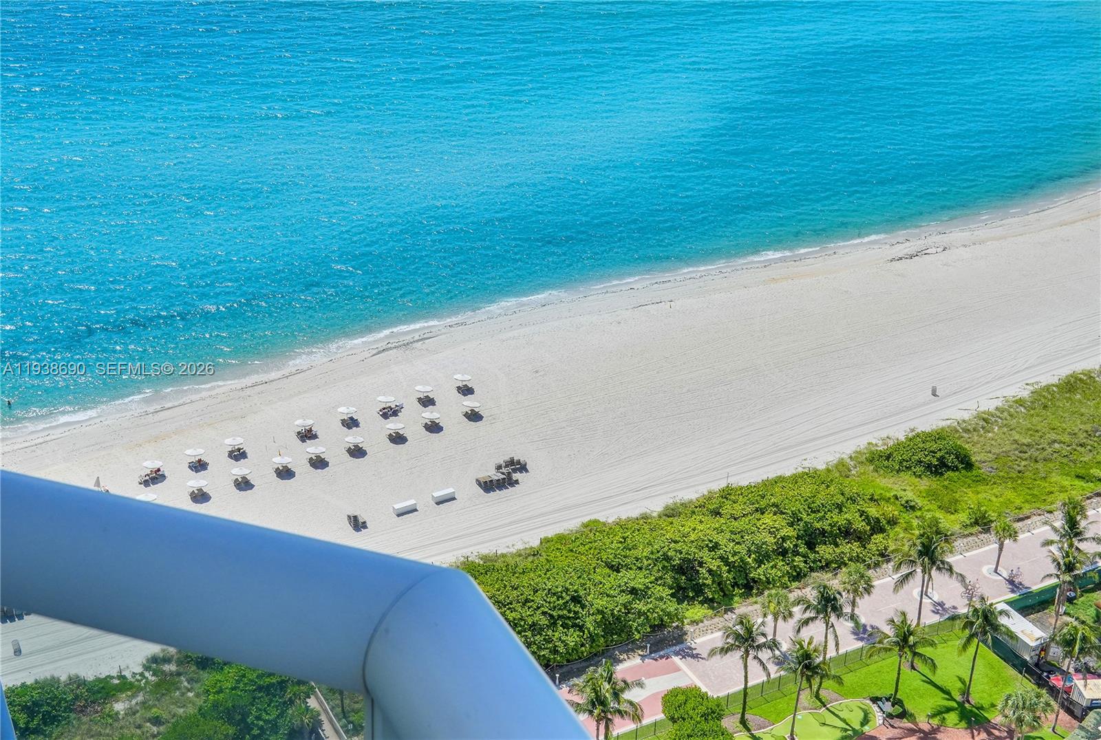 4779 Collins Avenue, Unit 3104 Miami Beach, FL 33140 - Photo 21 of 61 a view of balcony with wooden floor