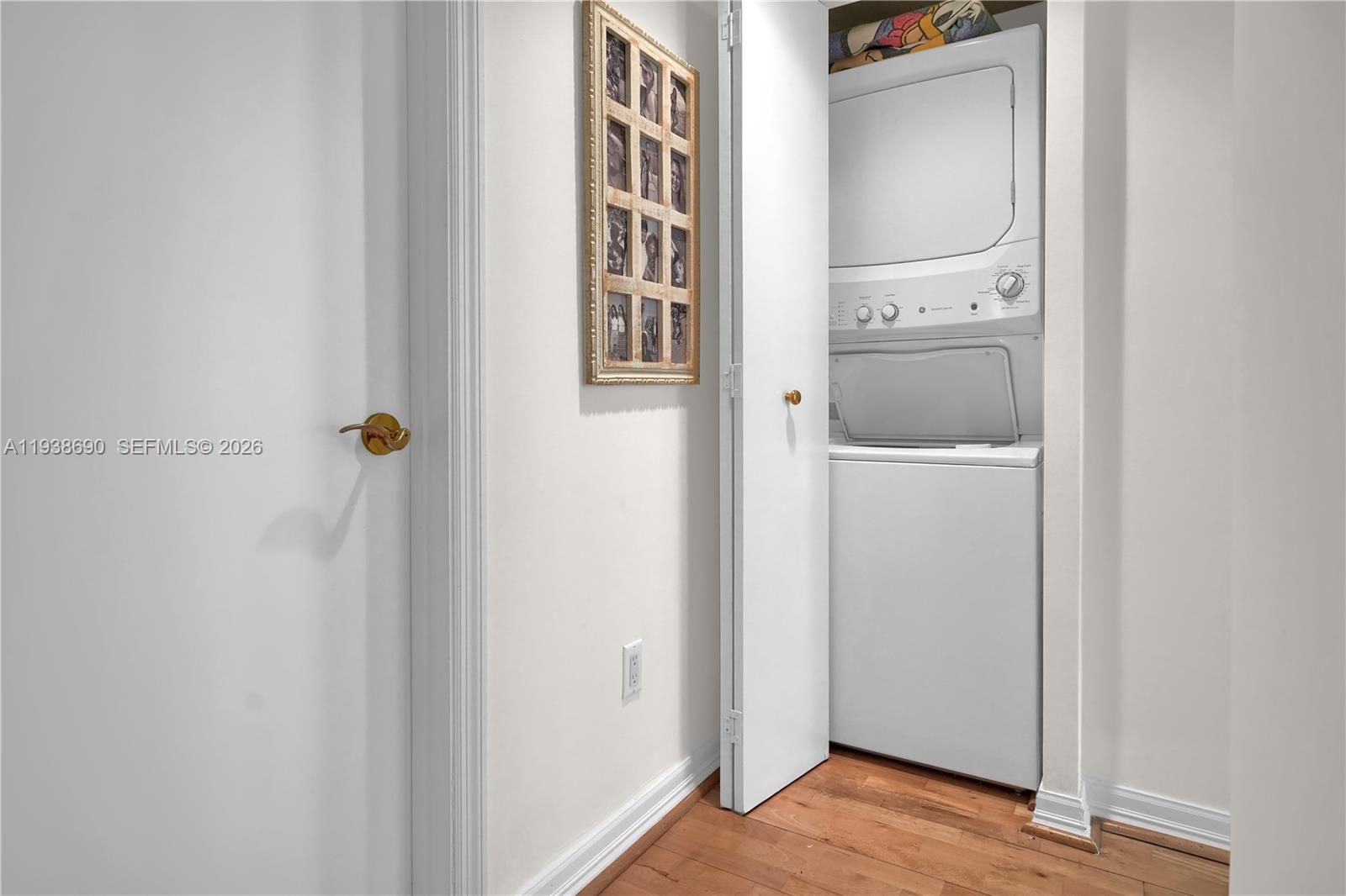 4779 Collins Avenue, Unit 3104 Miami Beach, FL 33140 - Photo 28 of 61 a view of a hallway with wooden floor