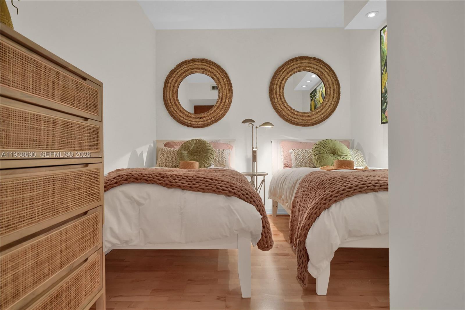 4779 Collins Avenue, Unit 3104 Miami Beach, FL 33140 - Photo 42 of 61 a bedroom with a bed and a lamp next to a window