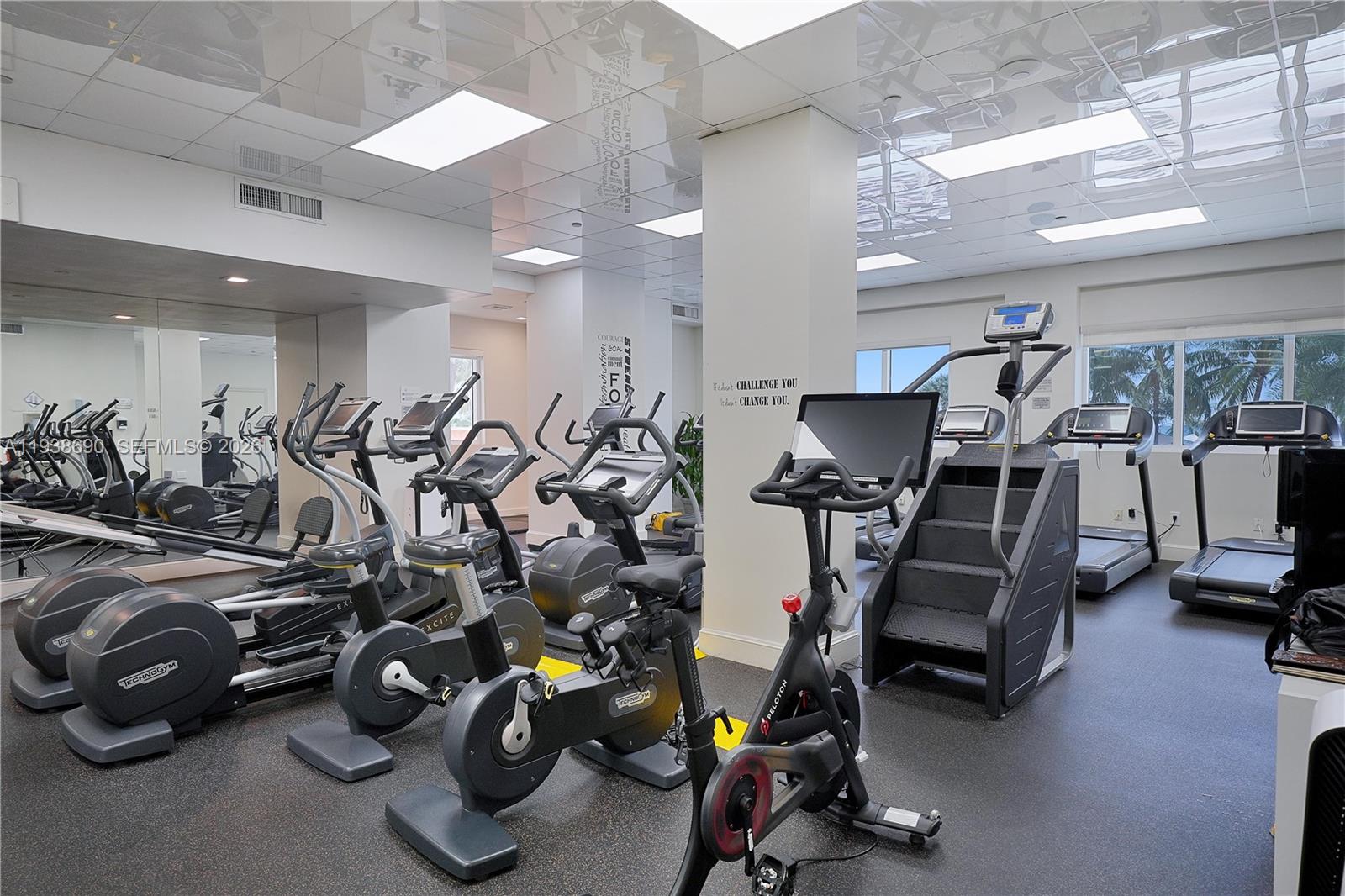 4779 Collins Avenue, Unit 3104 Miami Beach, FL 33140 - Photo 57 of 61 a view of a room with gym equipment