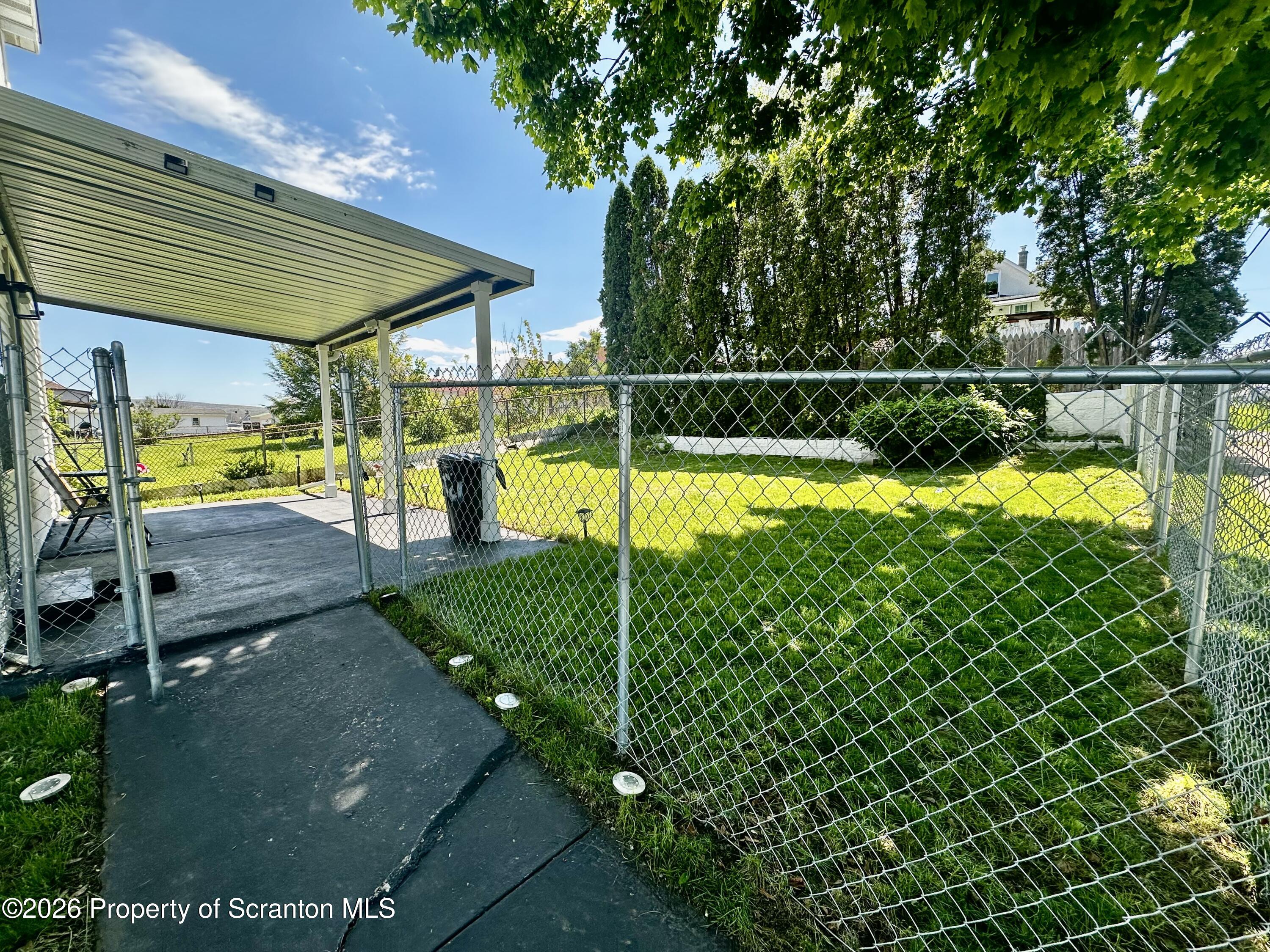 1727 Bulwer Street Scranton, PA 18504 - Photo 5 of 40 a view of a backyard with swimming pool