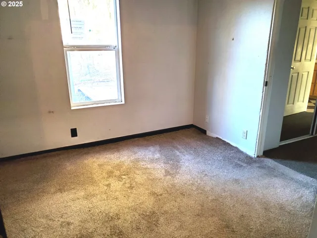 an empty room with a window