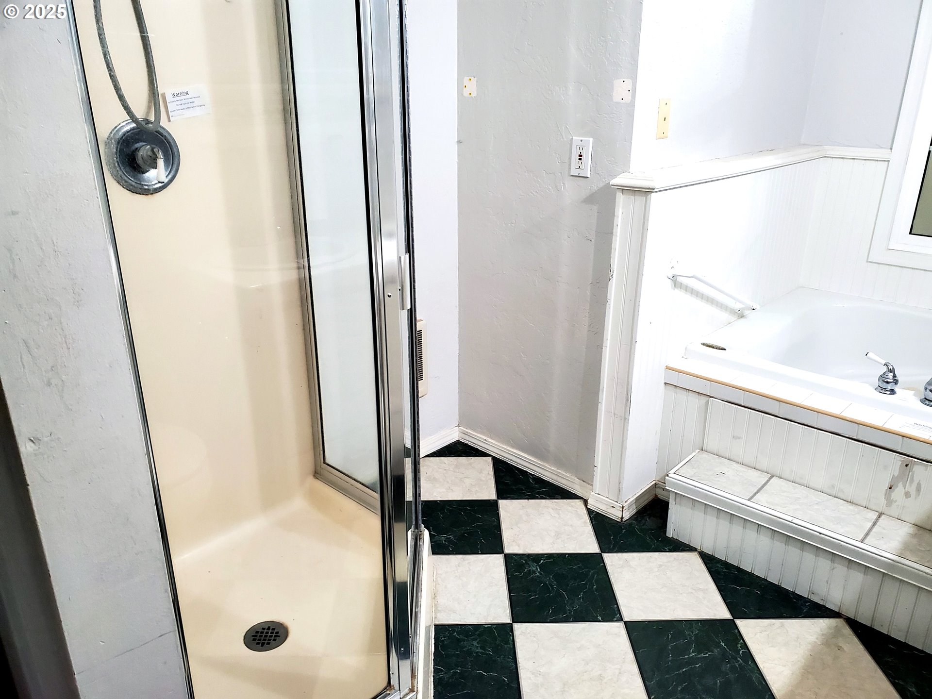 37186 Tree Farm Road Springfield, OR 97478 - Photo 22 of 37 a bathroom with a sink a mirror and shower