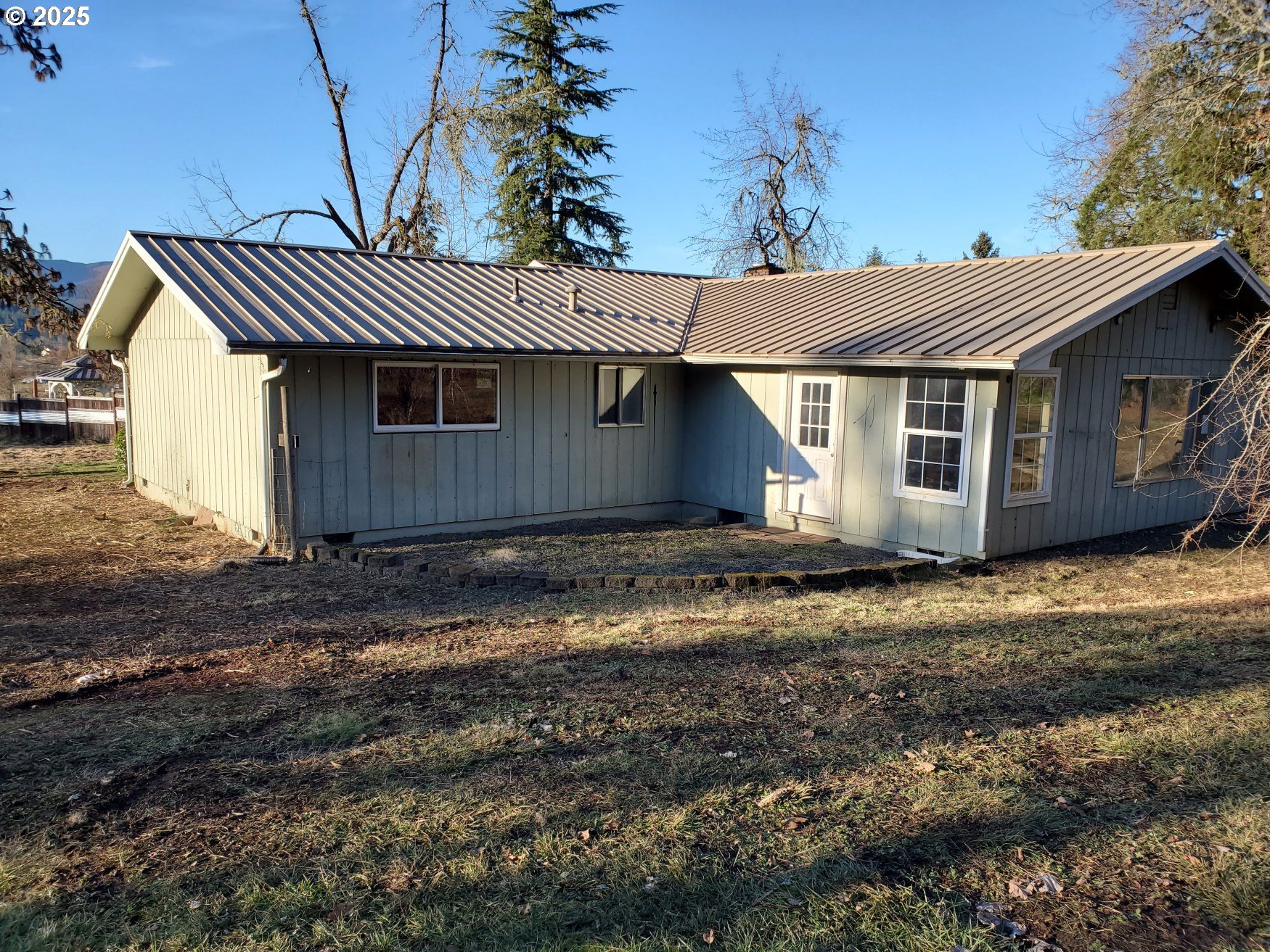 37186 Tree Farm Road Springfield, OR 97478 - Photo 35 of 37 a view of a house with a yard