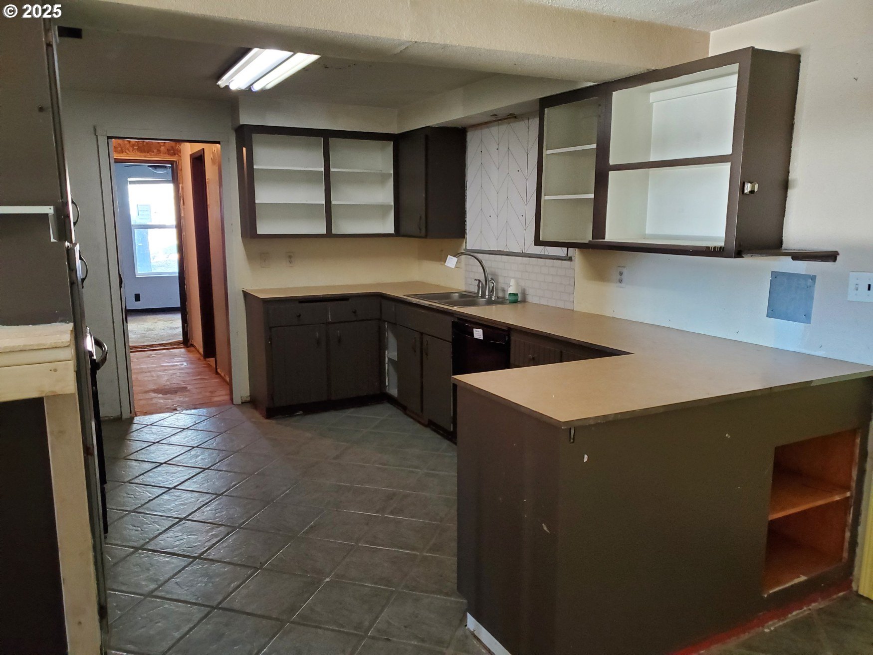 37186 Tree Farm Road Springfield, OR 97478 - Photo 5 of 37 a kitchen with a cabinets and white appliances