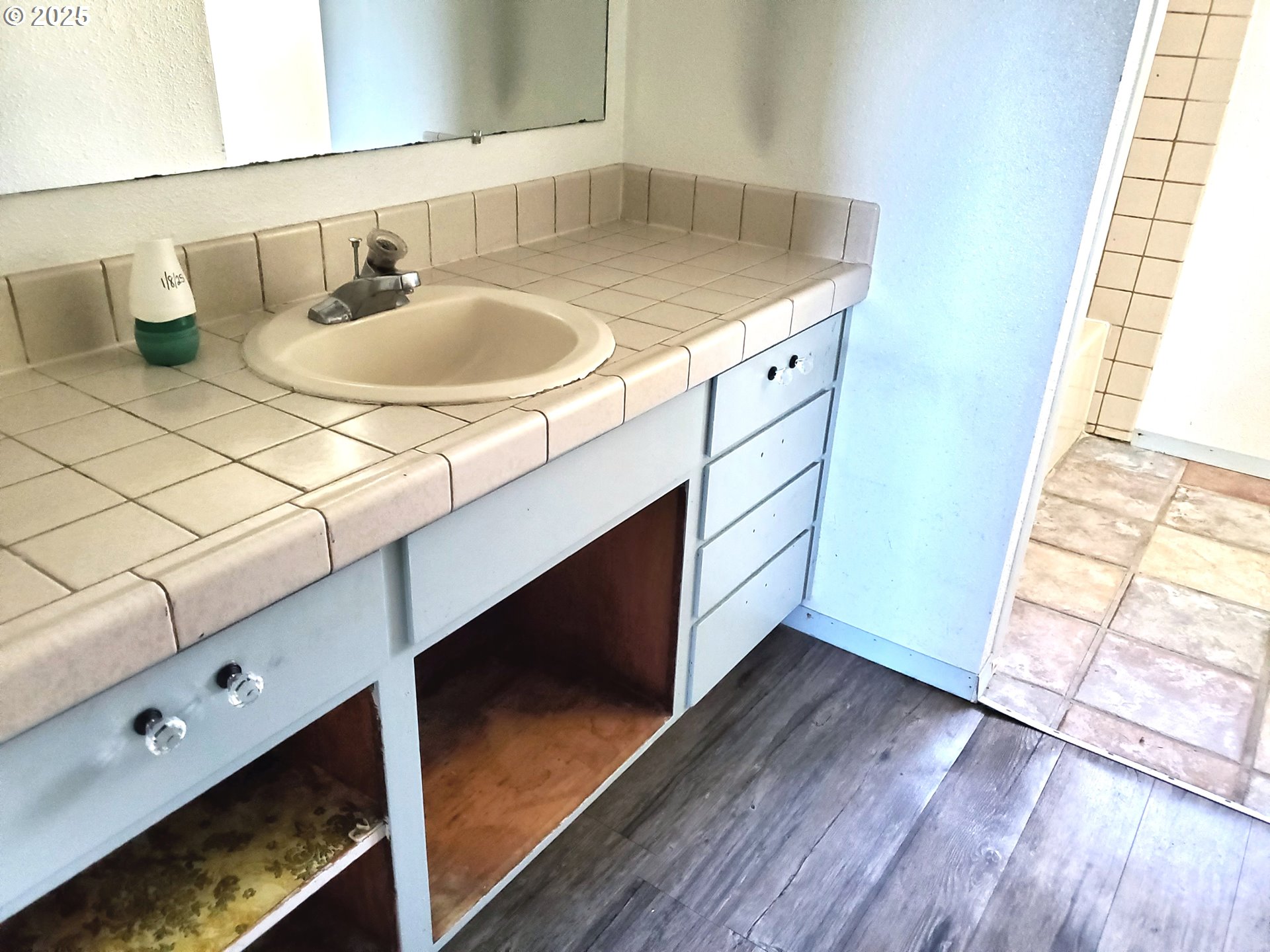 37186 Tree Farm Road Springfield, OR 97478 - Photo 10 of 37 a bathroom with a sink and a mirror