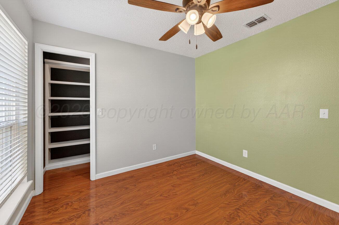 7009 Benwood Square Amarillo, TX 79109 - Photo 22 of 29 Bedroom 3