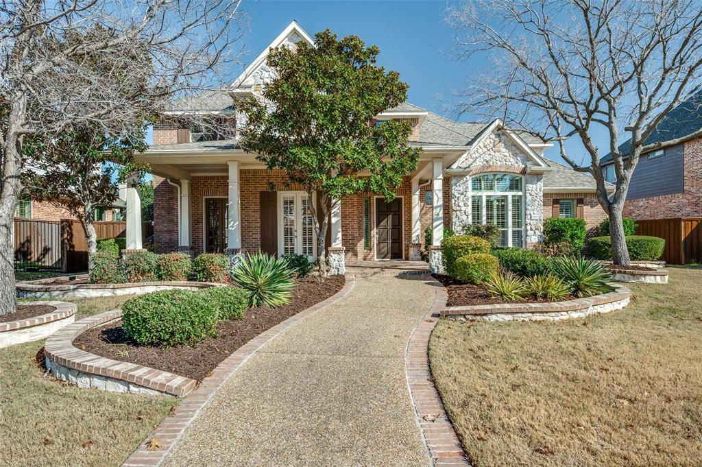 front view of a house with a small yard