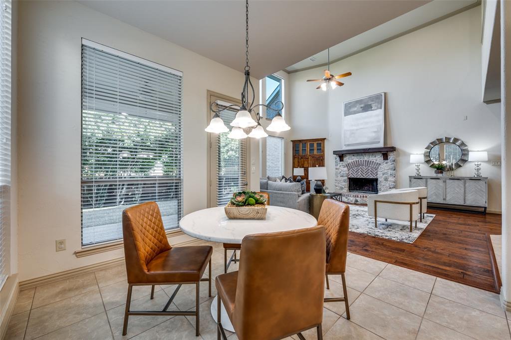 1318 Rio Grande Drive Allen, TX 75013 - Photo 17 of 38 a dining room with furniture a chandelier and window