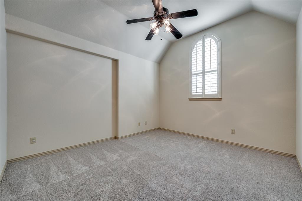 1318 Rio Grande Drive Allen, TX 75013 - Photo 28 of 38 an empty room with windows and fan