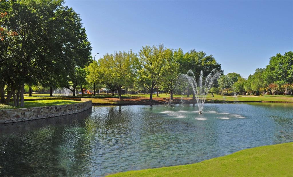 1318 Rio Grande Drive Allen, TX 75013 - Photo 33 of 38 a view of a swimming pool with an outdoor space and seating area