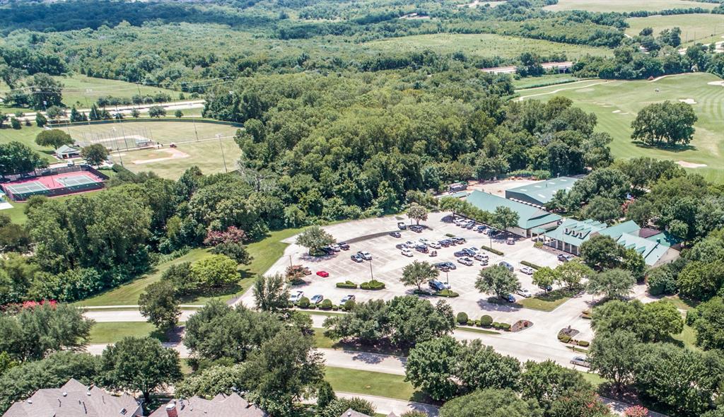 1318 Rio Grande Drive Allen, TX 75013 - Photo 34 of 38 an aerial view of residential houses with outdoor space and trees