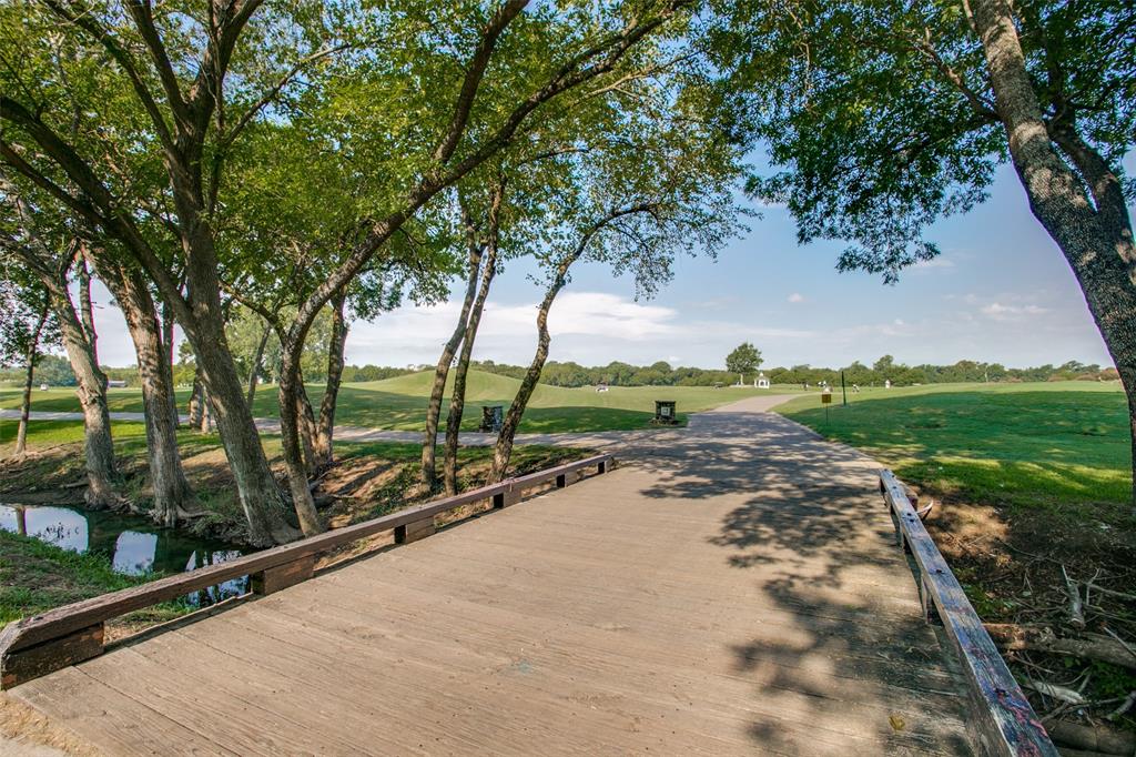 1318 Rio Grande Drive Allen, TX 75013 - Photo 35 of 38 a view of a street with a large tree