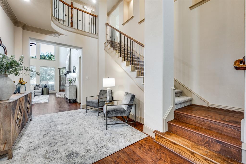 1318 Rio Grande Drive Allen, TX 75013 - Photo 4 of 38 a view of entryway and hall with wooden floor