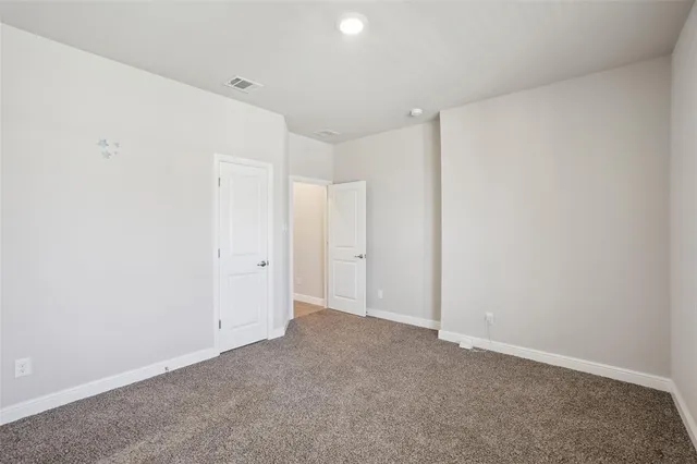 a view of a room with window and chandelier