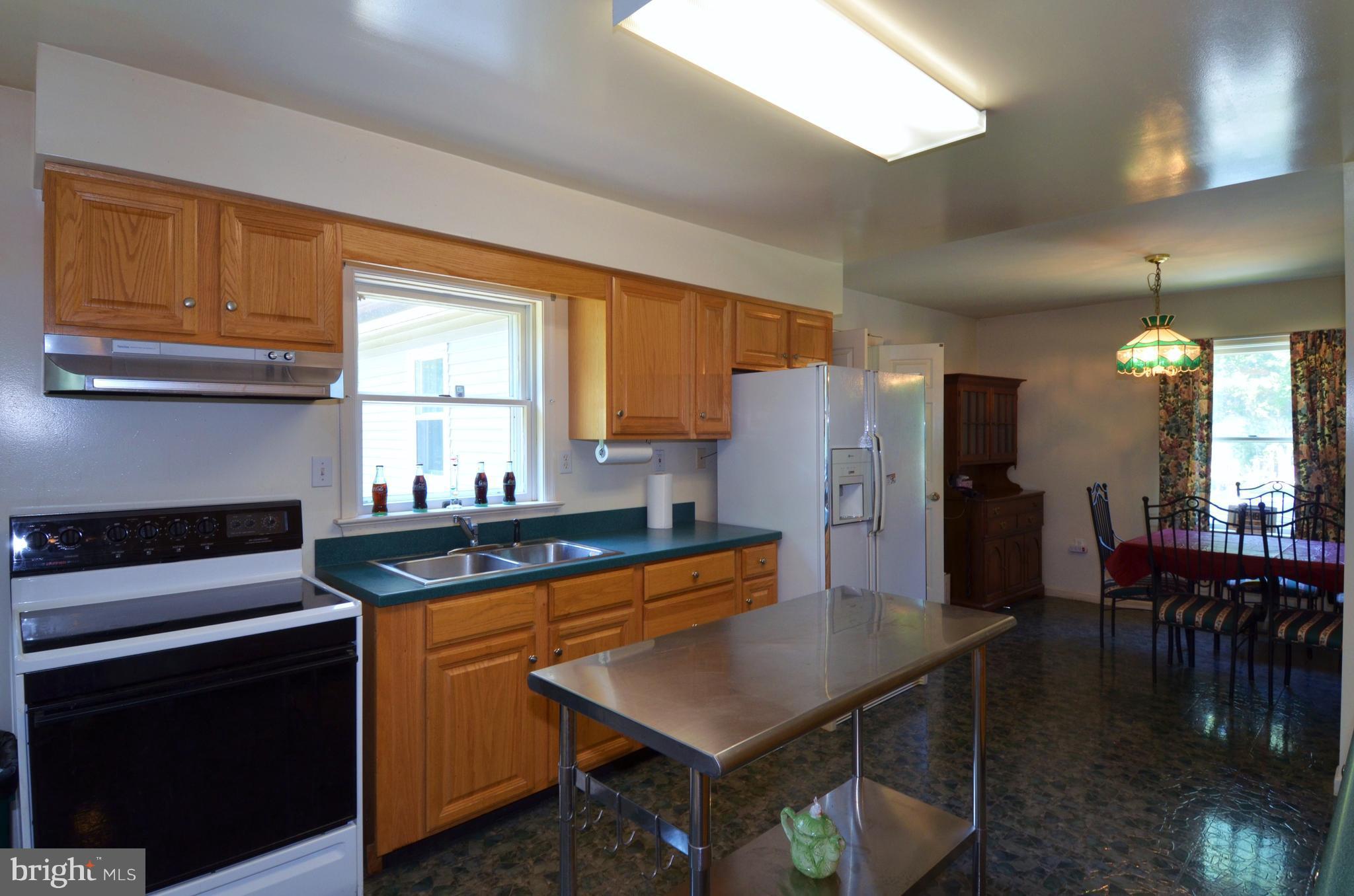 764 Summit Point Road Summit Point, WV 25446 - Photo 6 of 23 Spacious kitchen.
