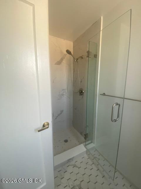 25 West Elm Street, Unit 40 Greenwich, CT 06830 - Photo 23 of 28 a bathroom with a shower
