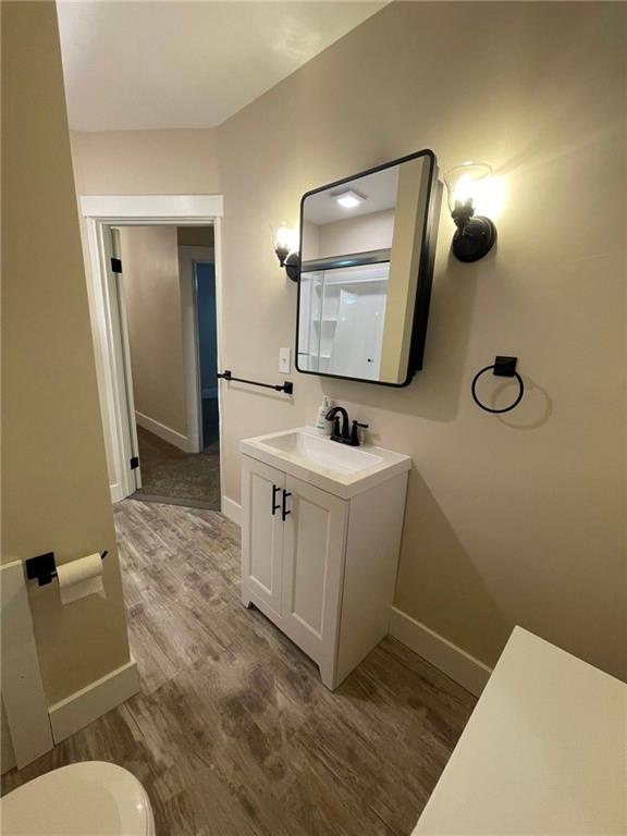 863 5th Avenue, Unit 2 Coraopolis, PA 15108 - Photo 11 of 17 a bathroom with a toilet sink and mirror