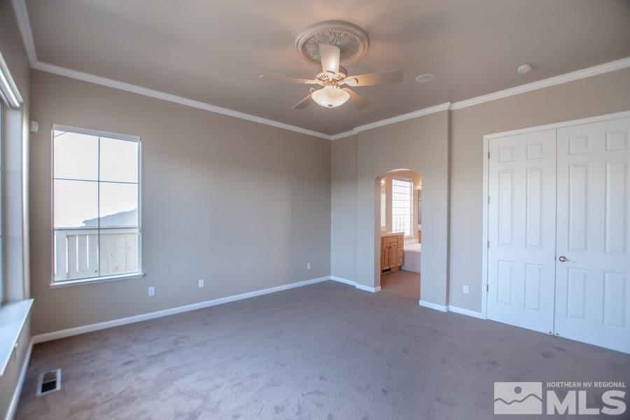 1815 Hunter Creek Road Reno, NV 89519 - Photo 16 of 25 wooden floor in an empty room with a window