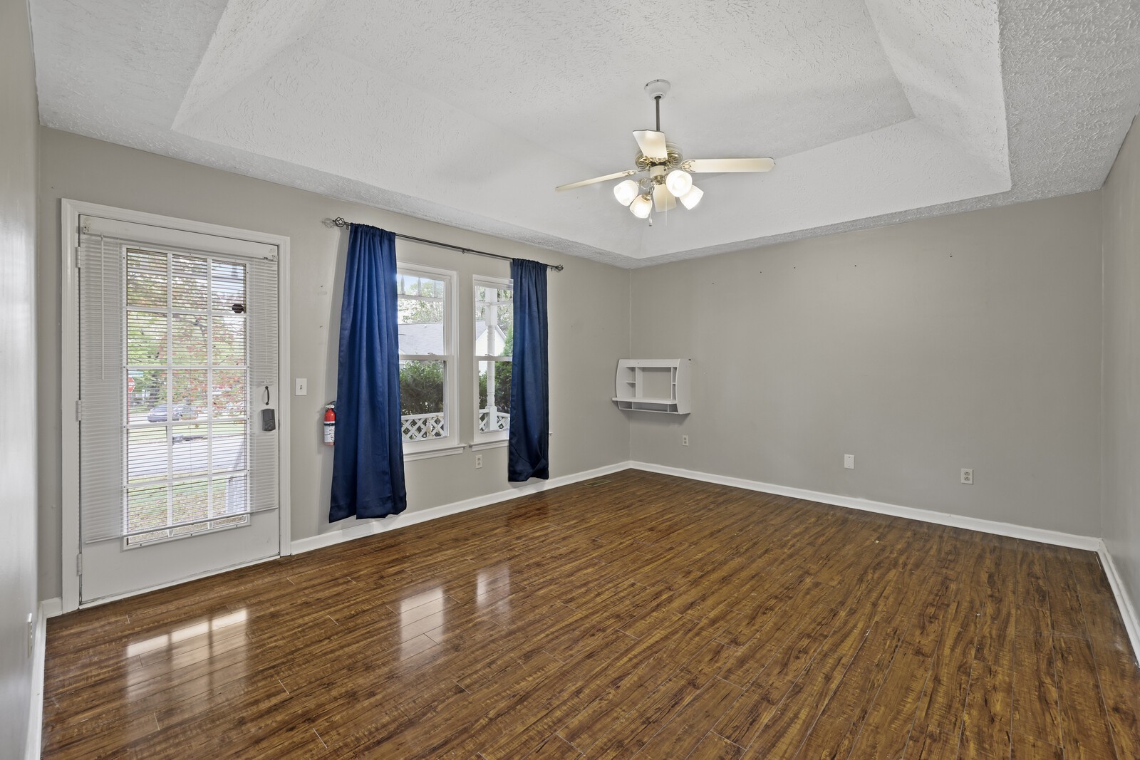 400 Hickory Timber Court Antioch, TN 37013 - Photo 19 of 38 a view of an empty room with wooden floor and a window
