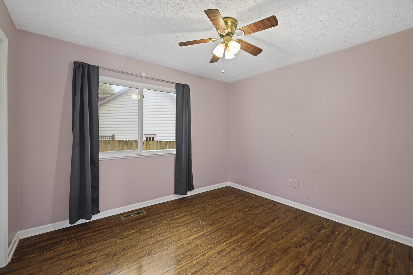 400 Hickory Timber Court Antioch, TN 37013 - Photo 24 of 38 an empty room with wooden floor and door