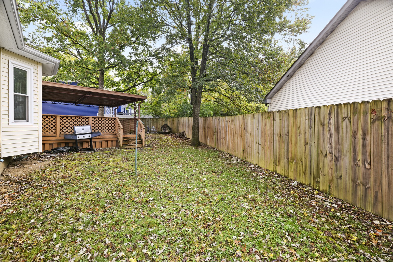 400 Hickory Timber Court Antioch, TN 37013 - Photo 37 of 38 a backyard of a house with table and chairs