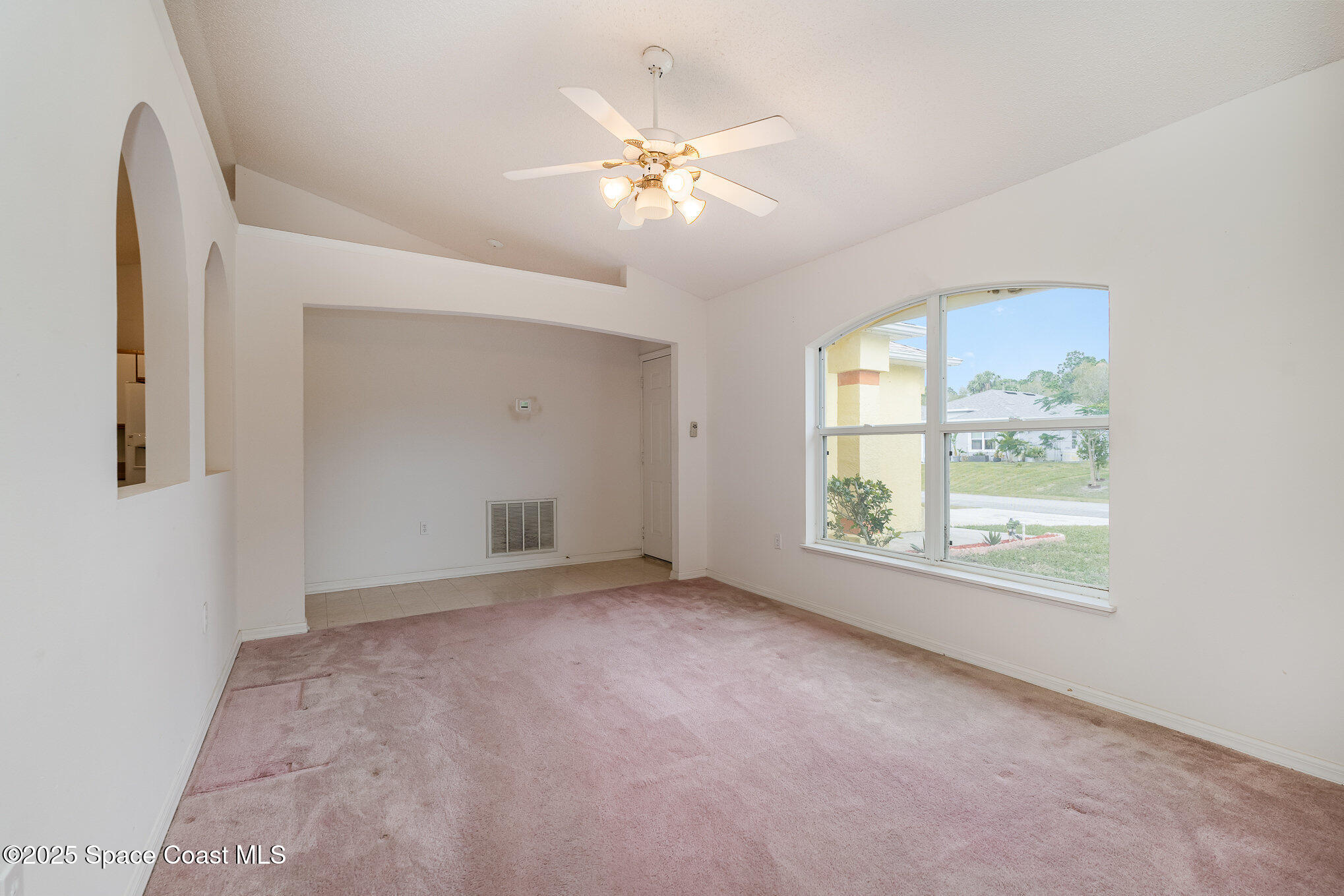1328 Whitehurst Road Southwest Palm Bay, FL 32908 - Photo 2 of 22 front room