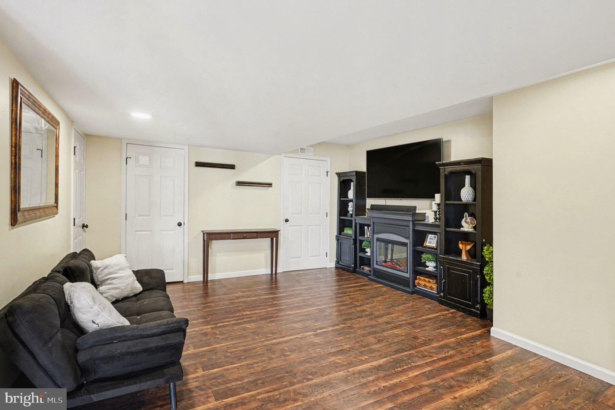 76 Gehringer Road Barto, PA 19504 - Photo 34 of 46 a living room with furniture and a flat screen tv