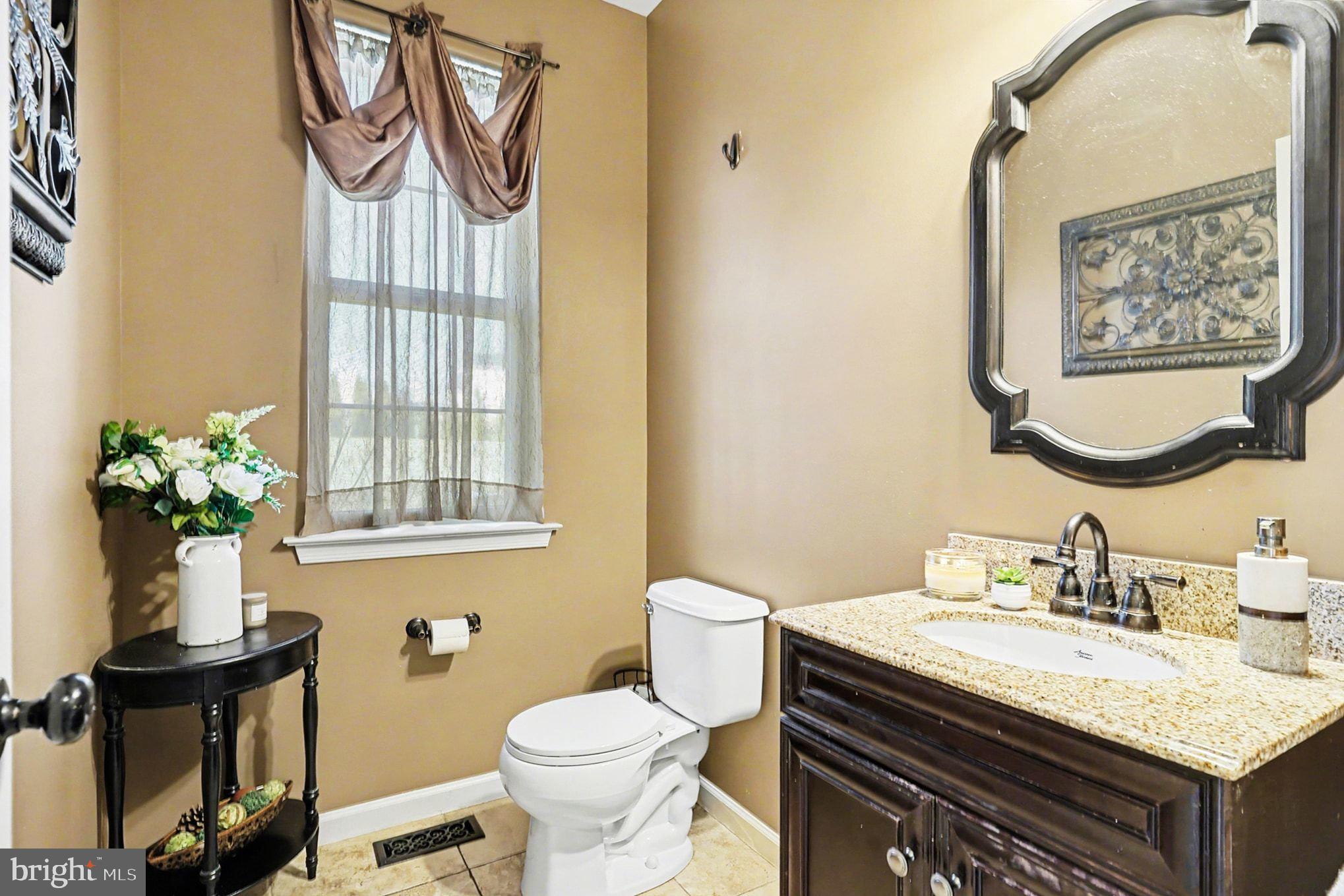 76 Gehringer Road Barto, PA 19504 - Photo 9 of 46 a bathroom with a granite countertop sink and a mirror