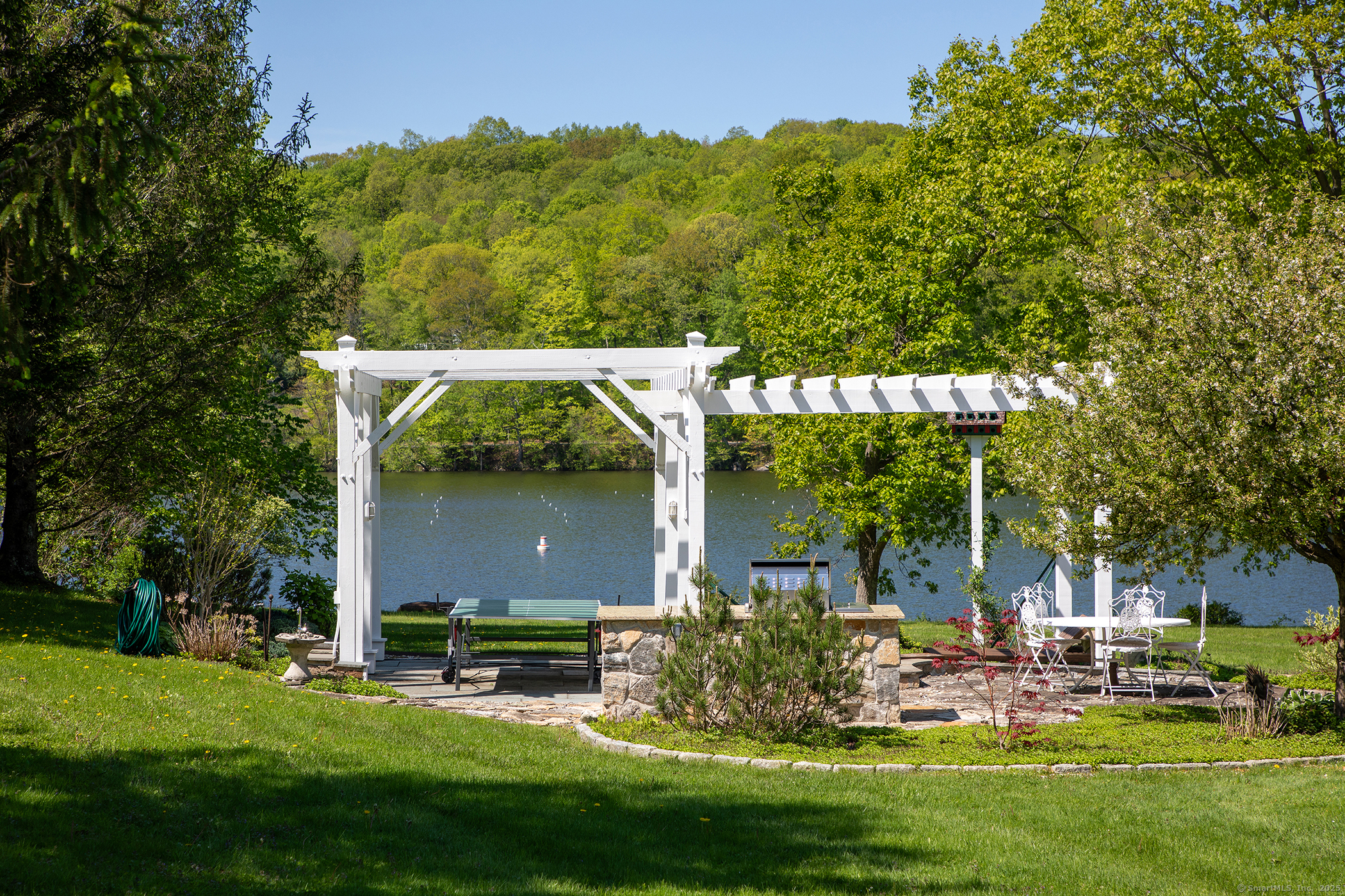 18 Arrow Point Road Warren, CT 06777 - Photo 11 of 30 a view of a house with a yard