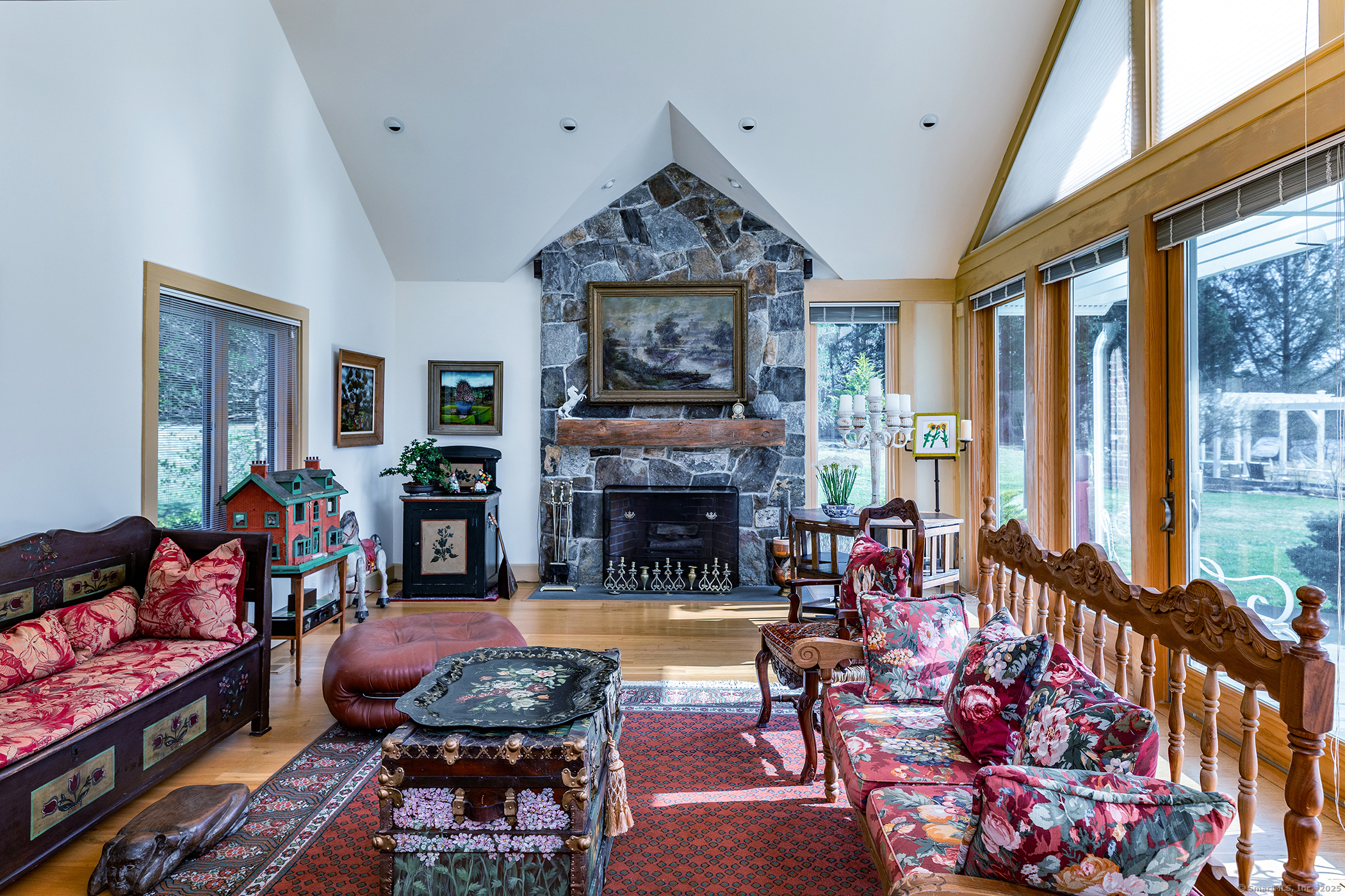 18 Arrow Point Road Warren, CT 06777 - Photo 14 of 30 a living room with furniture fireplace and flat screen tv