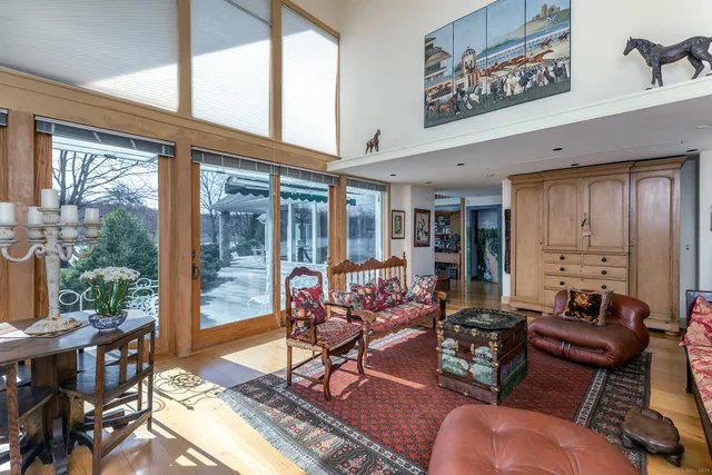 a kitchen with a table chairs and a dining table view